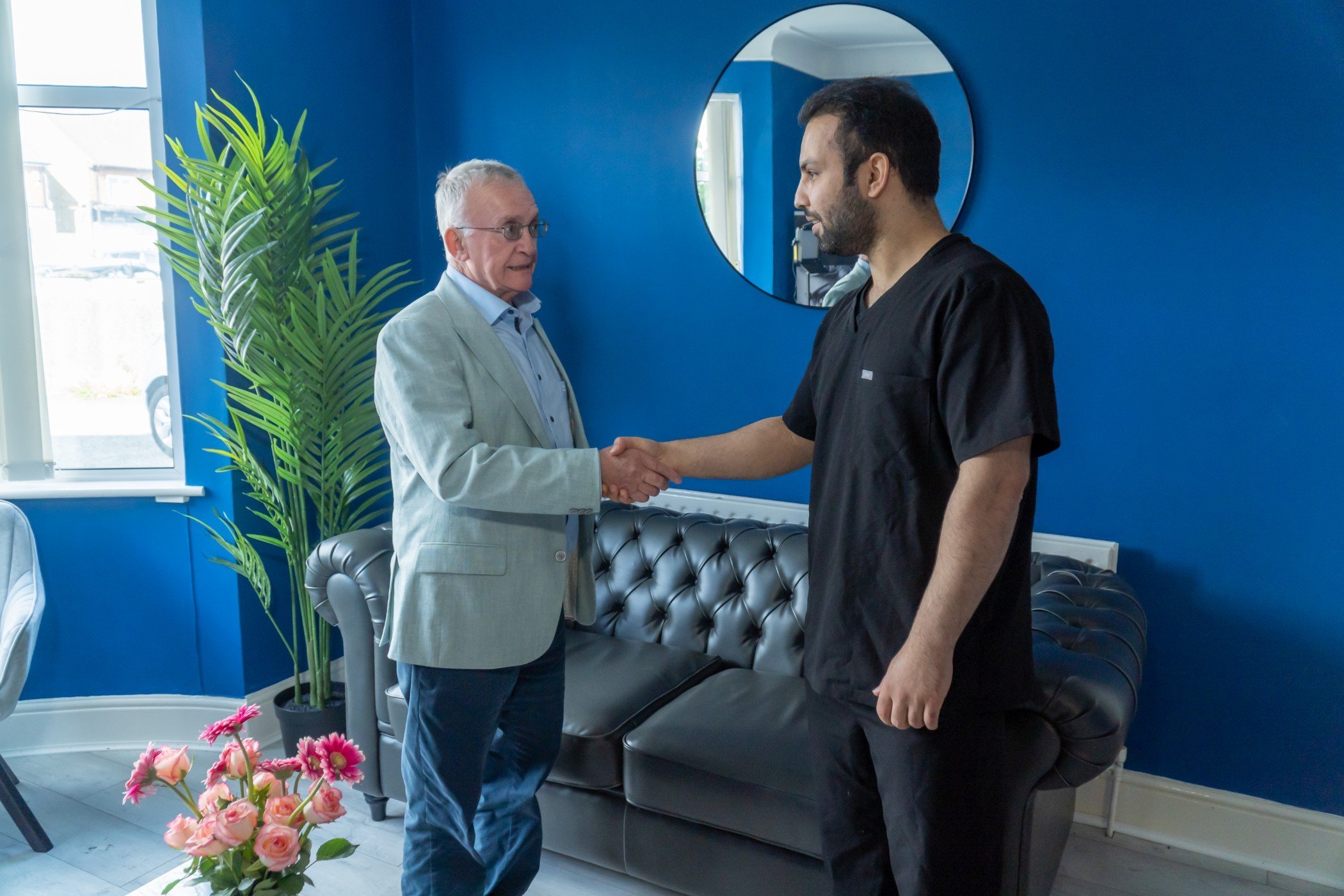 Patient shaking hands with dentist at Maypark Dental clinic in Dublin
